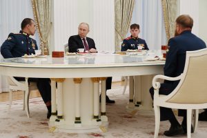 Russian President Vladimir Putin meets with the crew of the Alyosha