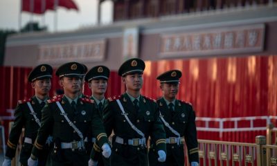 Vanguard funds invest in China military groups