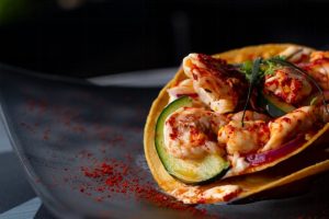 Photo by Alondra Medina: https://www.pexels.com/photo/spicy-shrimps-and-vegetable-in-a-taco-shell-5548452/