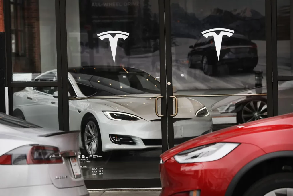 Tesla sales growth warning